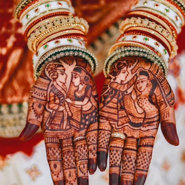 In this image you can see a dulha dulhan mehndi design by one of the best dulha dulhan mehndi designer in jhansi, Vijay Mehndi Art & Permanent Tattoo Art