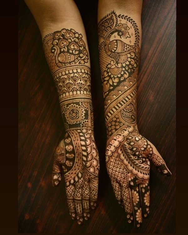 In this image you can see a madhubani mehndi design by one of the best madhubani mehndi designer in jhansi, Vijay Mehndi Art & Permanent Tattoo Art